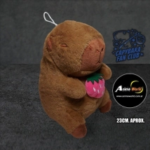 PELUCHE CARPINCHO-CAPIBARA CON ACCESORIO EN SUS MANOS #1 (23CM APROX) (P1537)